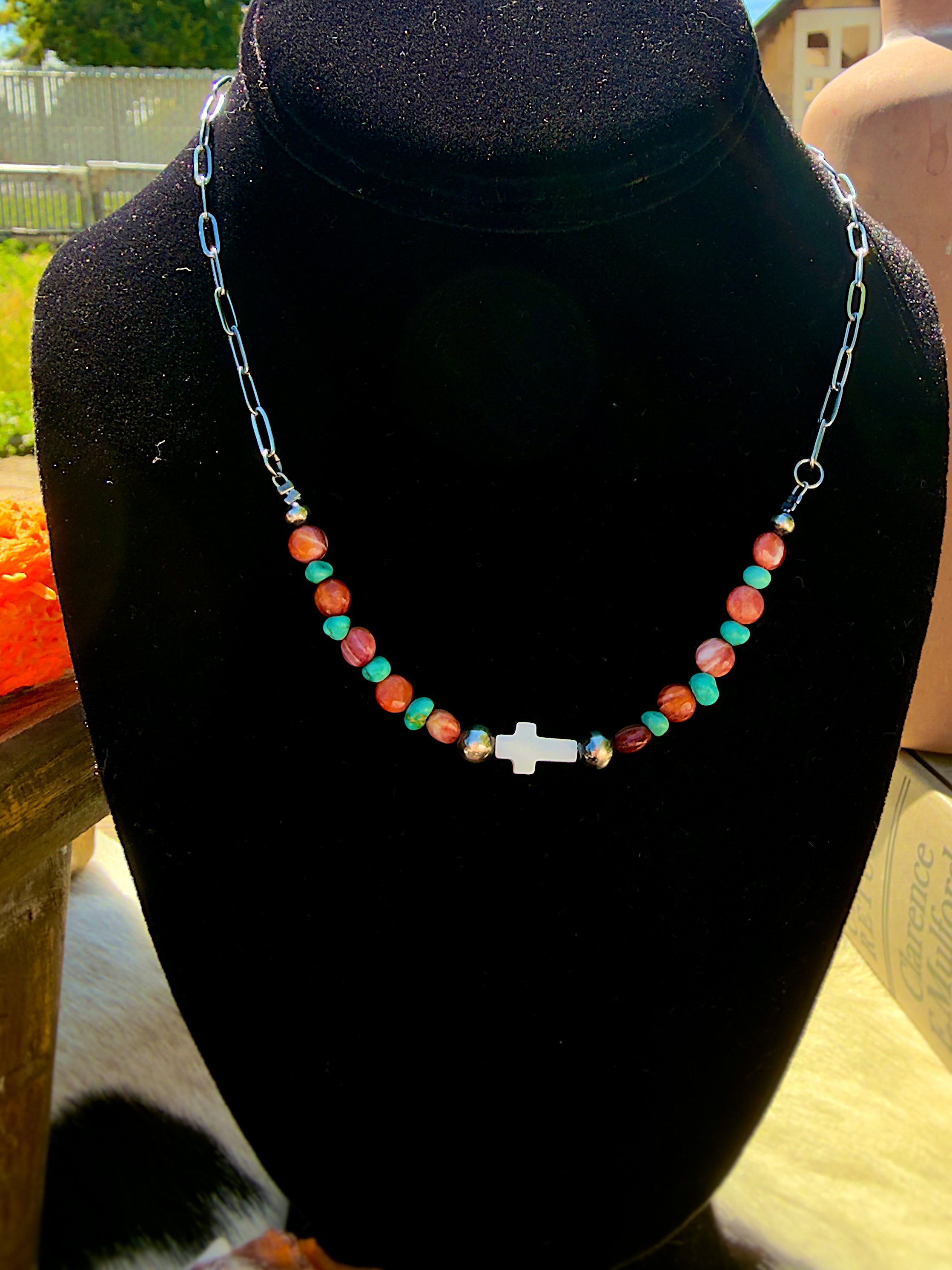 Lions Paw Shell & Lone Mountain Cross Necklace